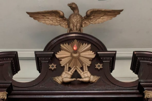 Pediment detail showing hands and eagle from Vilna Shul Synagogue